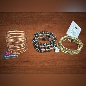 BUNDLE OF 3 WRAPAROUND BRACELETS 2 gold tone 1 black.